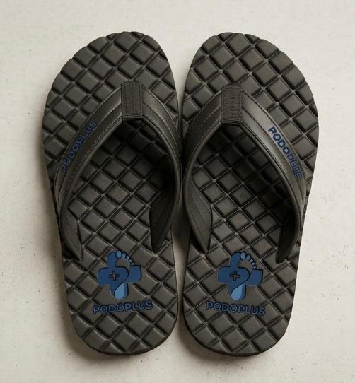 Pair of Podoplus MCP thong sandals with a quilted grid footbed